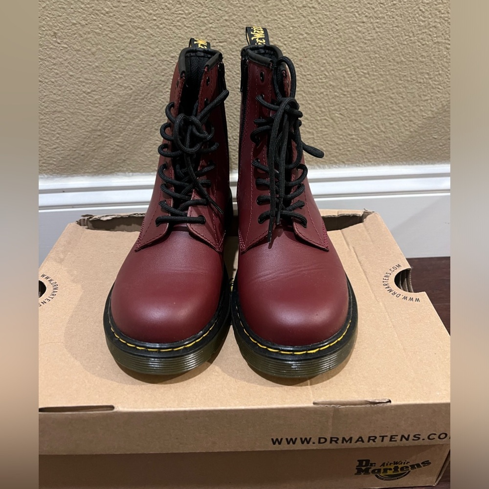 Dr. Martens (Air Wair) combat boots.